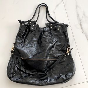 Black patent leather bag great for travel